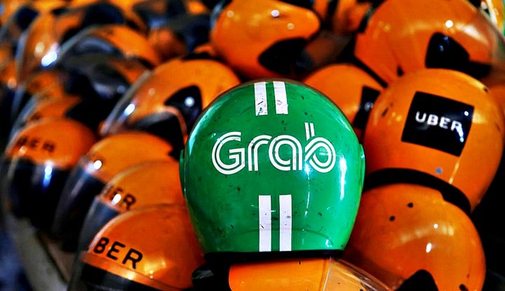 Grab Caplok Uber